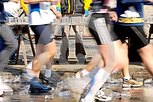 Runners Passing Water Stand