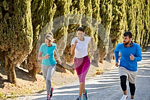 Runners running on road.Young people exercising