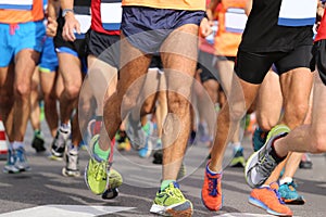 runners with sportswear and running shoes during the marathon