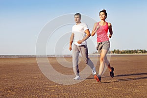 Runners training outdoors working out in nature