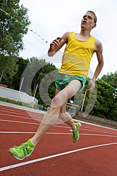 Running athlete in mid-air