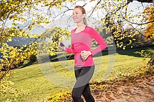 Running through the autumn forest