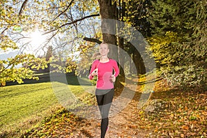 Running through the autumn forest