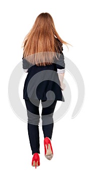 Running business woman. back view. going young girl in suit. Re