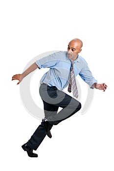 Running businessman isolated in white