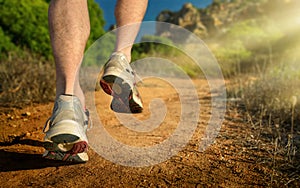 Running, closeup of the runner`s feet