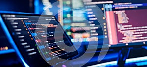 Running Computer data programming. Coding script text on screen. Notebook closeup photo.