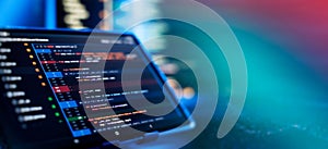 Running Computer data programming. Coding script text on screen. Notebook closeup photo.