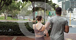 Running couple, city fitness and road crosswalk, workout and cardio exercise for healthy lifestyle. Back of sports man