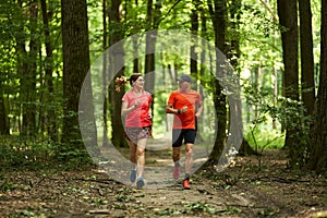 Running couple in the forest