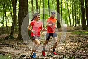 Running couple in the forest