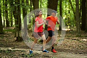 Running couple in the forest