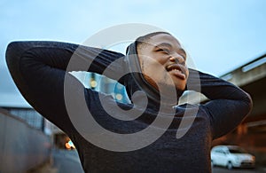 Running, fitness and city with a sports black man taking a rest during his exercise or workout in the evening. Training