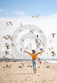 Running girl on the beach