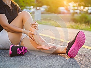 Running injury leg accident- sport woman runner hurting holding