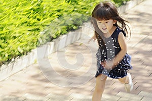 Running Japanese girl in summer