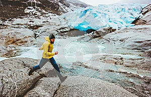 Running Man in glacier mountains travel adventure
