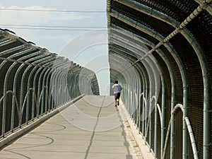 Running over a pedestrian bridge