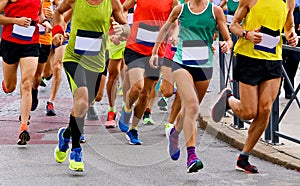 running race with feet and legs of runners sports athletes
