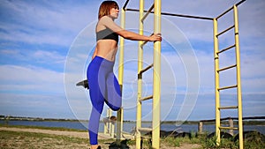 Running runner woman stretching leg muscle preparing for sunset trail run in outdoor summer nature. Female athlete lower