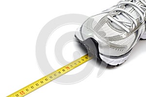 Running shoe concept and centimeter photo