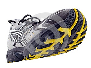 Running Shoe yellow black tread pattern tilted up