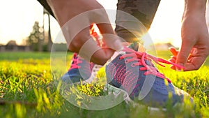 Running shoes - woman tying shoe laces