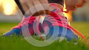 Running shoes - woman tying shoe laces