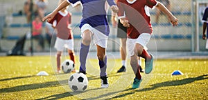 Running Soccer Football Players. Footballers Kicking Football Game on Training Unit