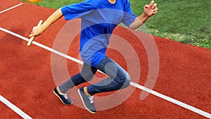 Running on the stadium track athlete