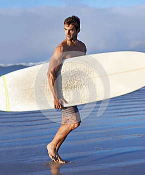 Running, surfing and man with surfboard at beach for, waves on summer vacation, weekend and holiday by sea. Travel