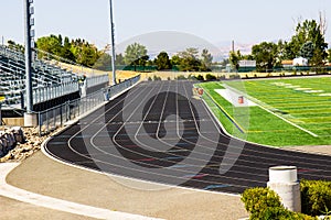 Running Track With Bleachers & Field