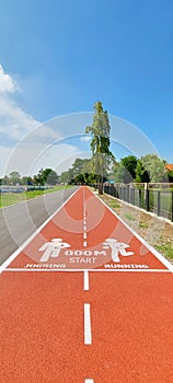 running track, exercising outdoors by running every day helps keep everyone healthy