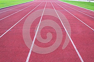 Running track and green grass,Direct athletics Running track