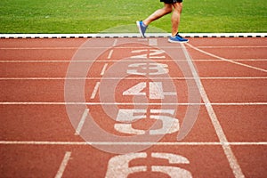 Running track number and athletics running exercise on tracks