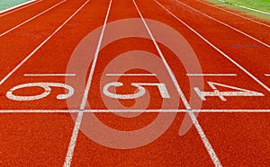 Running track with Number, starting runner