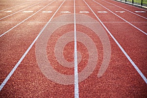 Running track with numbered lanes and crisp lines.