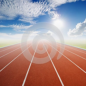 Running track with one lanes with blue sky