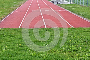 Running track for races over short distances or sprints with four lanes numbered from one to four.