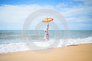 Running in waves excited romantic female on beach walk sunny background