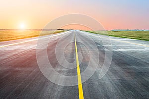 Runway asphalt the airport in the morning at dawn sunset sun light