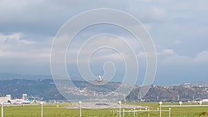 Runway take off airplane, airstrip sky with clouds background. Travel aviation concept