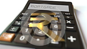 Rupee money symbol on the keys and MORTGAGE text on calculator display, conceptual 3d rendering