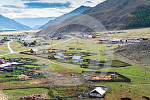 Rural autumn mountain landscape with a village