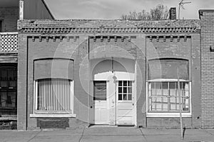 Rural business front facade architecture in black and white. Small town USA, typical country life