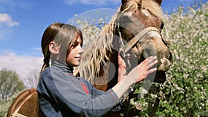 Rural child with a favorite pet horse.