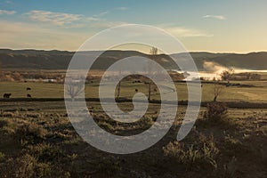 Rural Farm Scene Along Misty River Landscape