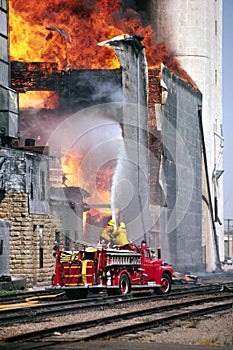 Rural Firefighters Battle Large Grain Bin Fire