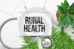 rural health word on notebook,stethoscope and green plant