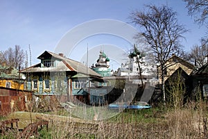 Rural house on a background of the Orthodox churches.